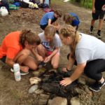 Campers working on a fire at the Amigo Centre in southern Michigan.