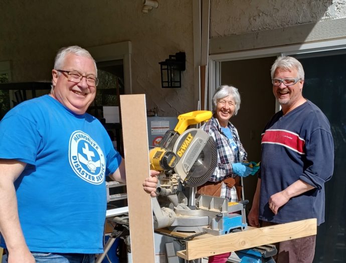 Volunteers Mark Rempel, Shirley Gotzke and Fred Rempel at a house being repaired in B.C.'s Fraser Valley.