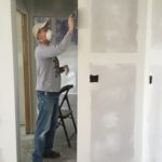 Weekly Report – Paradise, CA May 2 – May 6 man sanding a newly finished wall