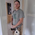 5. Zach Bomberger (weekly volunteer) working on drywall
