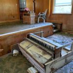 A piano lays on its back after extreme flooding destroyed a local church in Eastern Kentucky