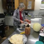 Cook in Jennings preparing food for volunteers