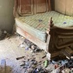 Heavily damaged room sits in ruins from flooding