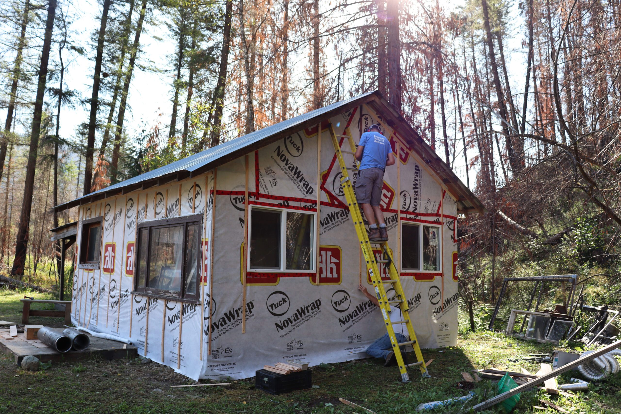 MDS volunteers make final upgrades to Heather Muraca's cabin near Adam's Lake, British Columbia.MDS photo/Nikki Hamm Gwala