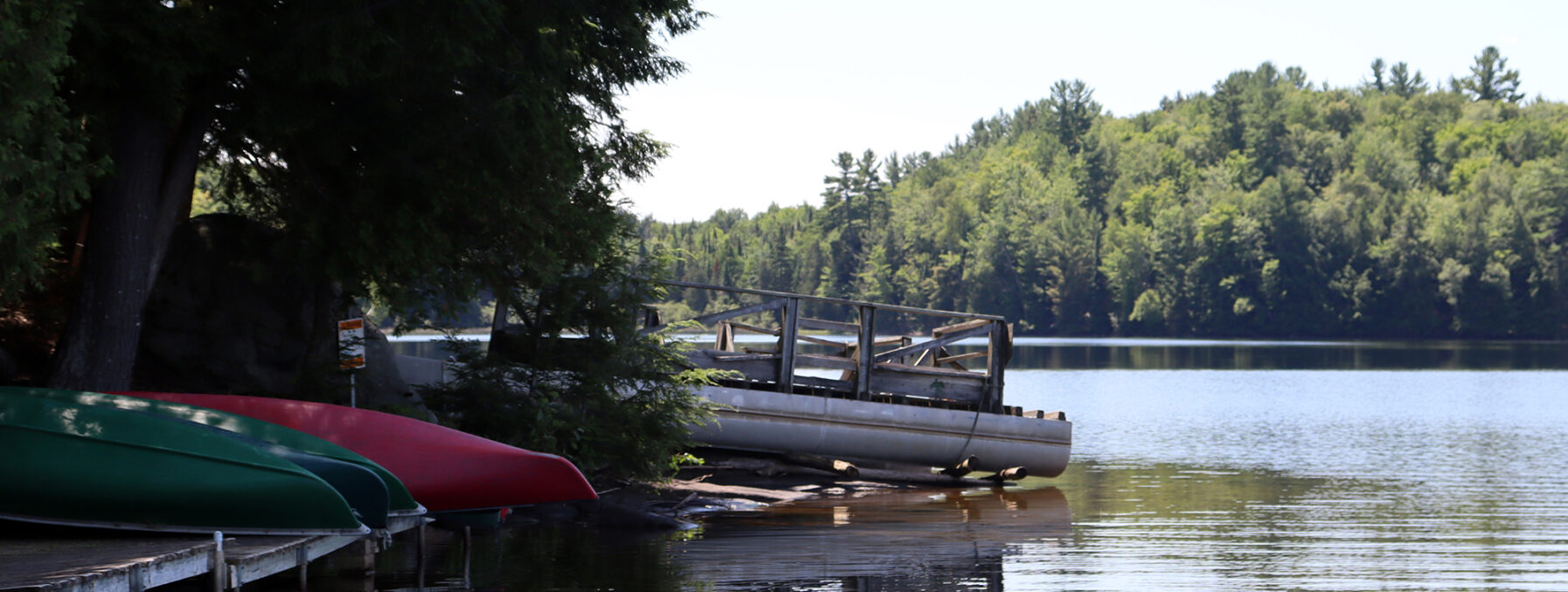 Canoes at the shore of an Ontario, Canada, lake.