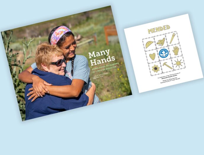 A book cover and an illustrated print are displayed on a light blue background. The book, titled Many Hands: Being Good Neighbors in Times of Disaster by Julie Kaufman and Susan Kim, features a cover image of a young woman with a colorful headband embracing an older woman wearing sunglasses and a navy blue jacket, both smiling warmly in an outdoor setting with greenery. Next to the book is a children's book titled Mended, featuring a hand-drawn quilt-like design with nine squares containing simple illustrations of a hard hat, a helping hand, a flashlight, a heart, a medical symbol, a glove, a flower, a hammer, and a sun, all outlined in black with yellow accents. The light blue background provides a clean, soft contrast to the items.