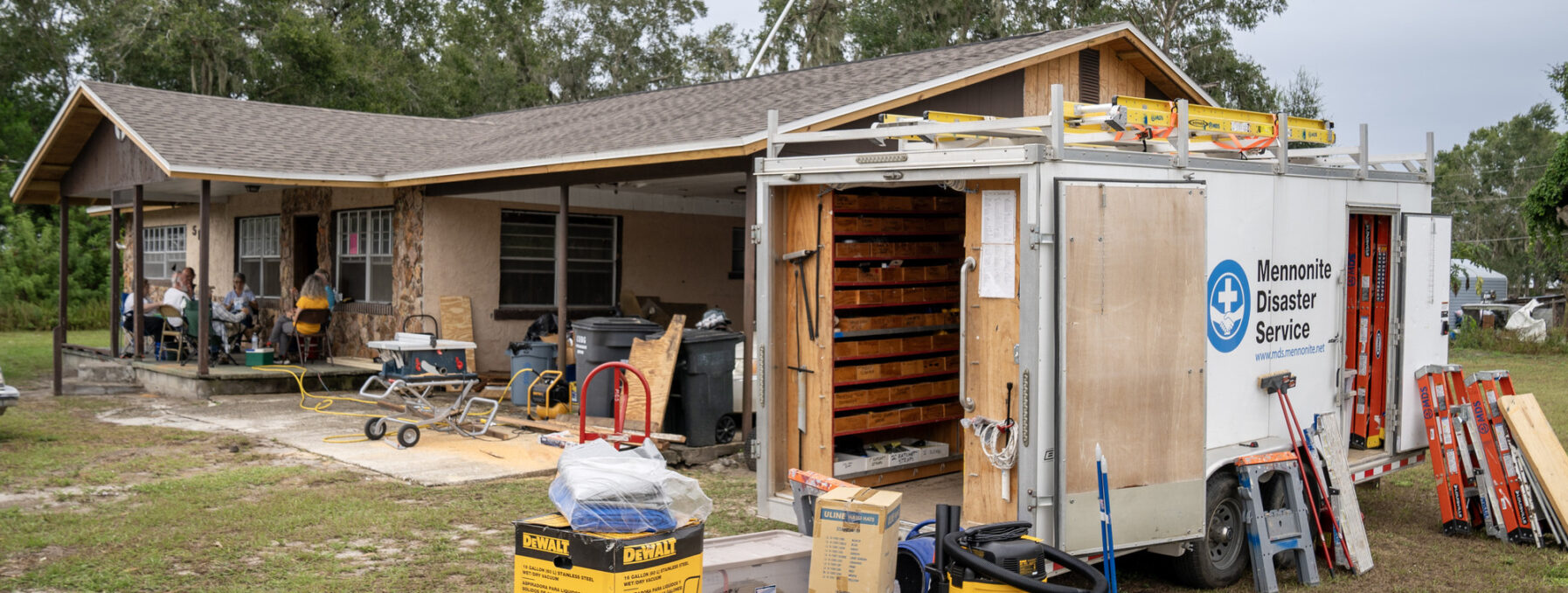 An MDS tool trailer in front of a home restoration project in Southwest Florida