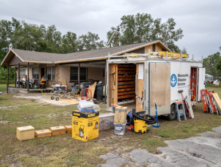 An MDS tool trailer in front of a home restoration project in Southwest Florida